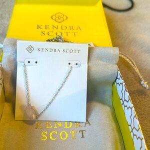 Kendra Scott necklace with silver chain and crystal pendant